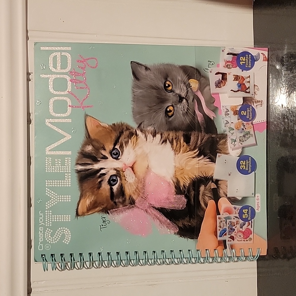 Create your Style Model Kitty activity book.
